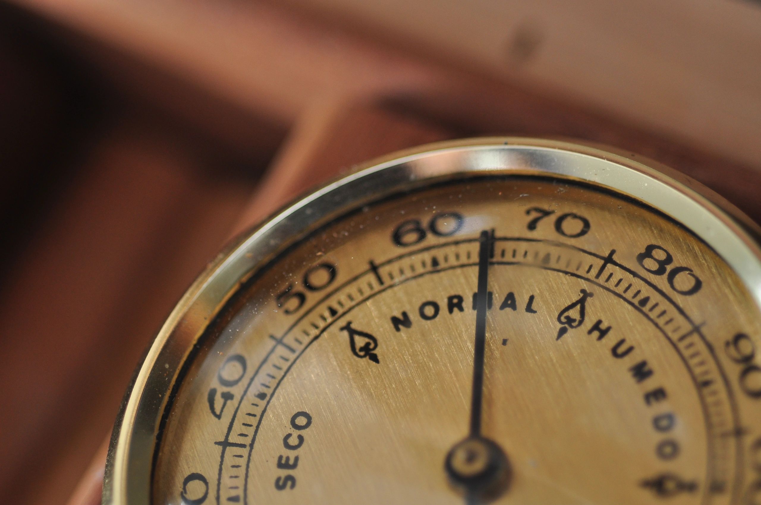 Cigar humidor hygrometer showing humidity and temperature